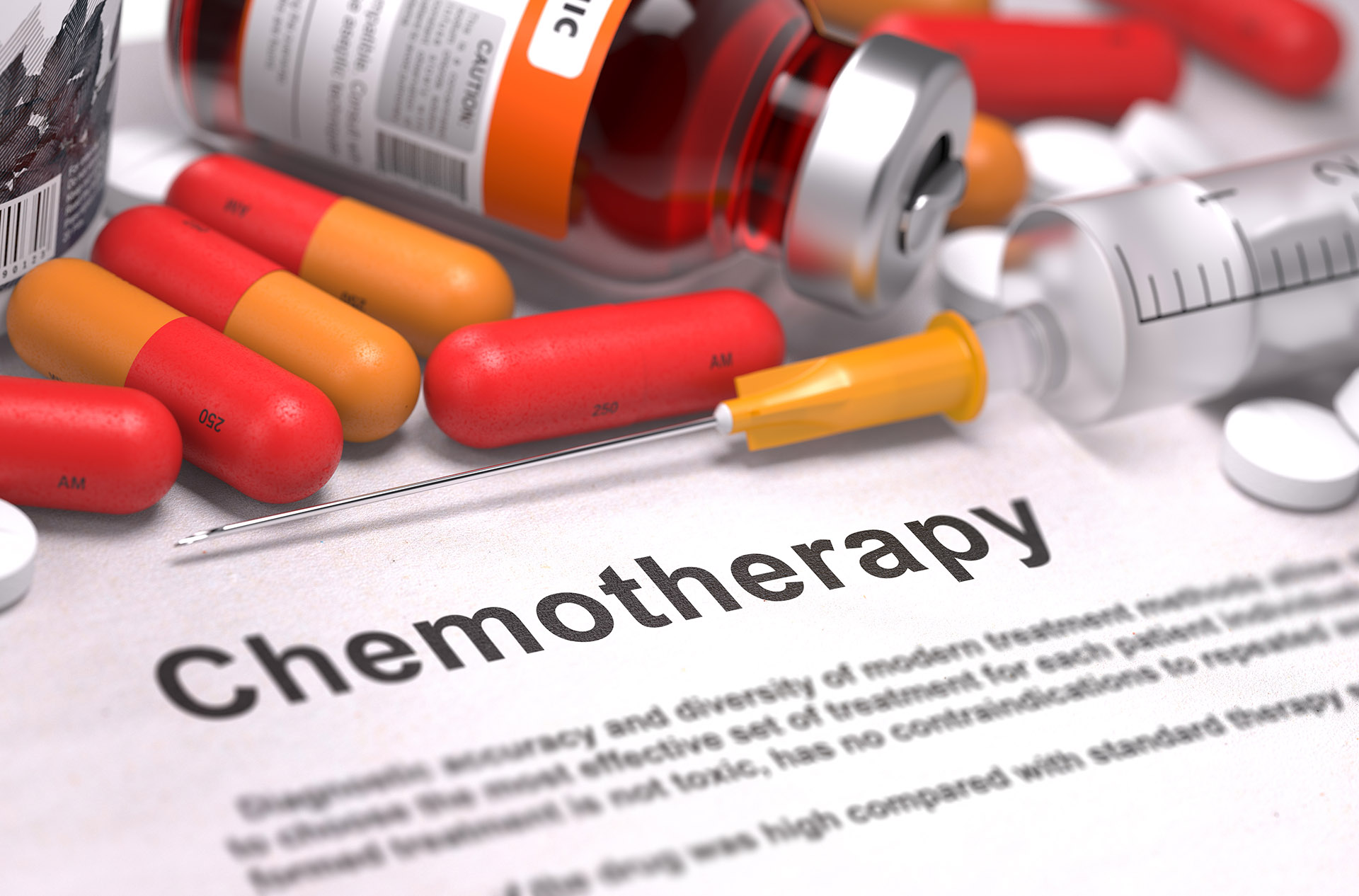 Chemotherapy - Medical Concept. On Background of Medicaments Composition - Red Pills, Injections and Syringe.