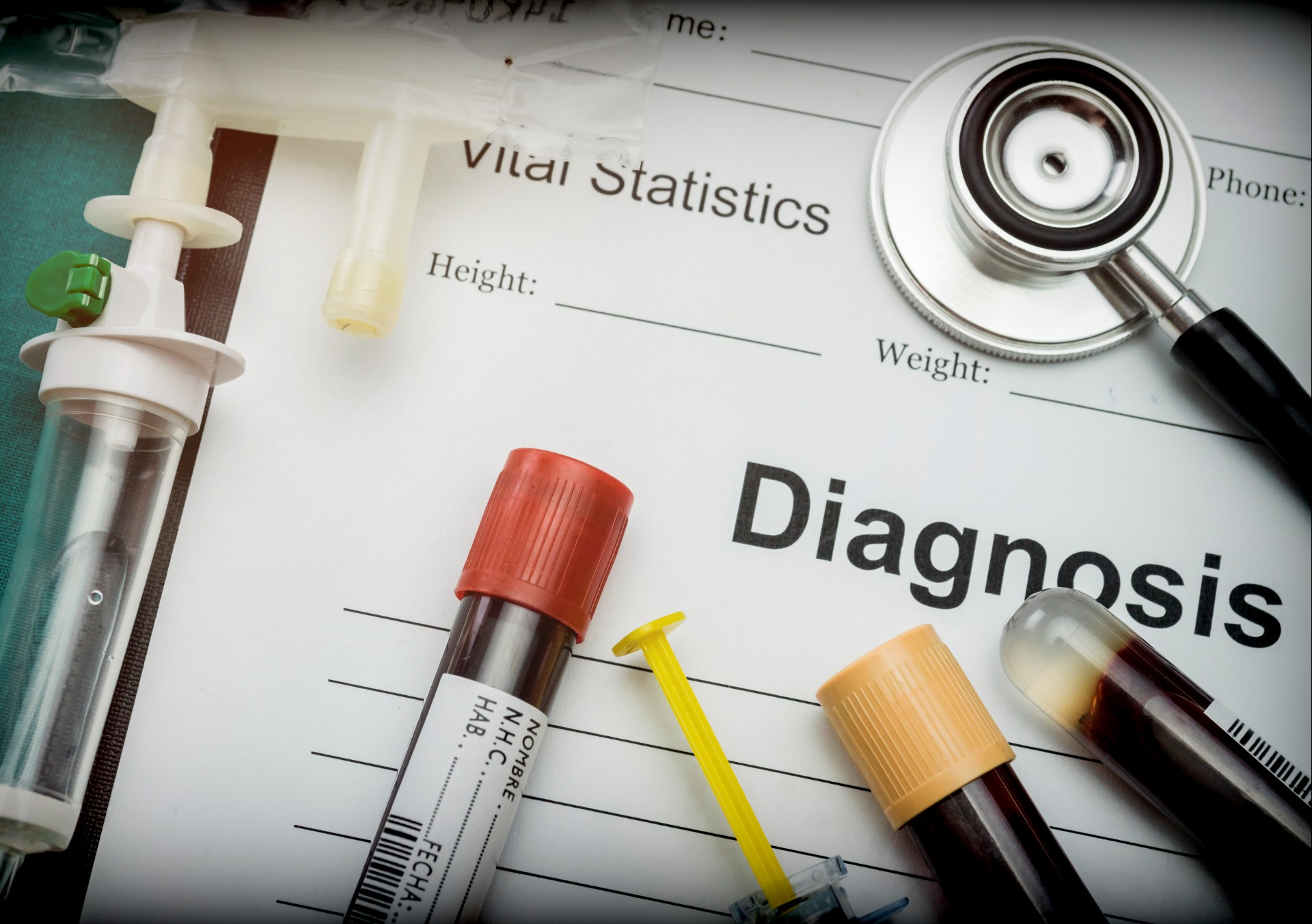 Diagnostic form, Vial of blood samples and Medicine in a hospital, conceptual image