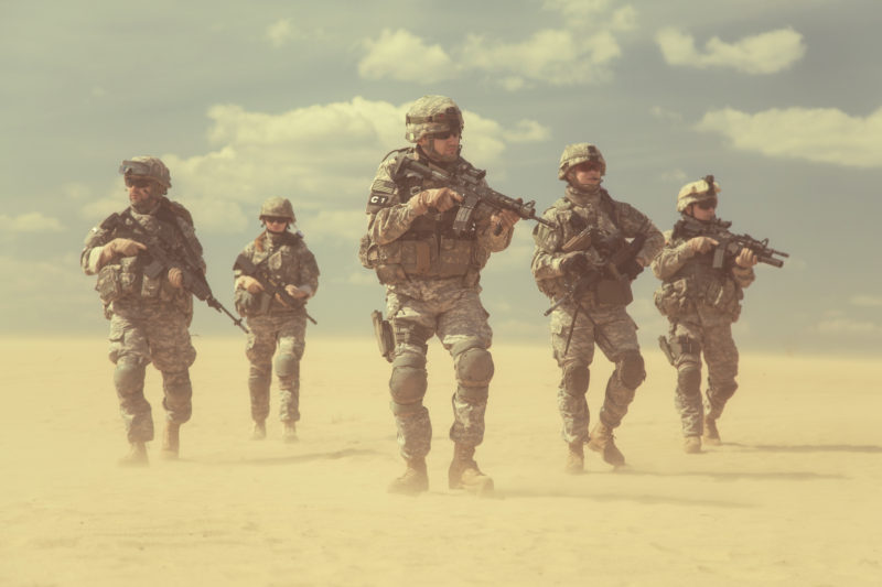 United States paratroopers airborne infantrymen in action in the desert